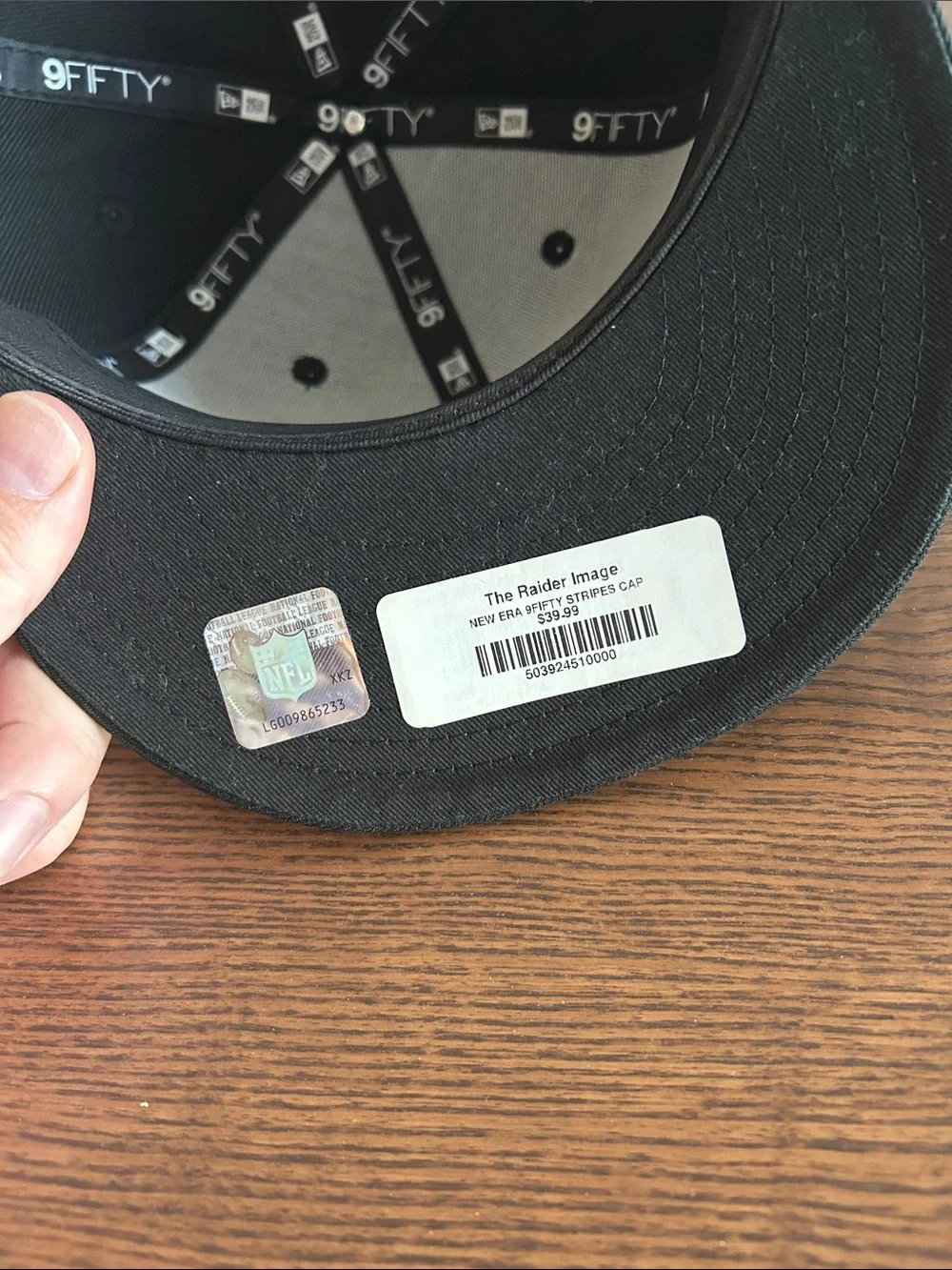New Era Black & White Raiders Pinstripe Snapback Hat